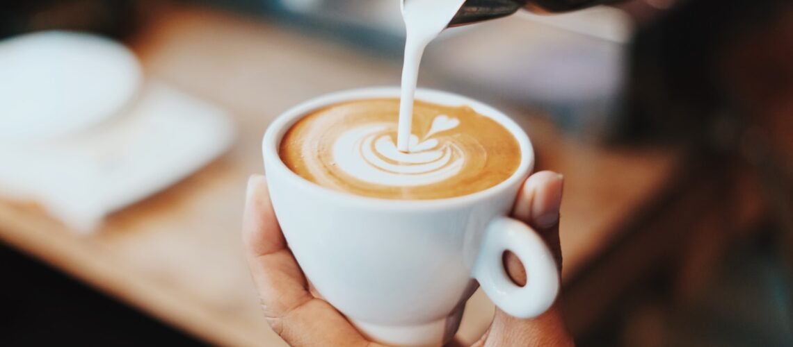 person making latte art
